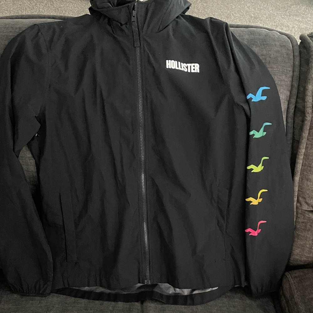 Hollister Black Hooded Windbreaker with Multicolor Seagull Sleeve Accents